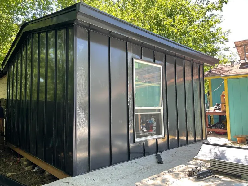 Black standing seam metal wall panels for Roof Inspection in Sparta